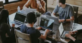 Group of young people working on computers