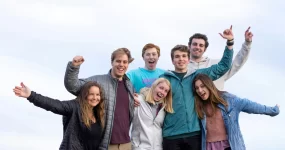 Group of friends cheering